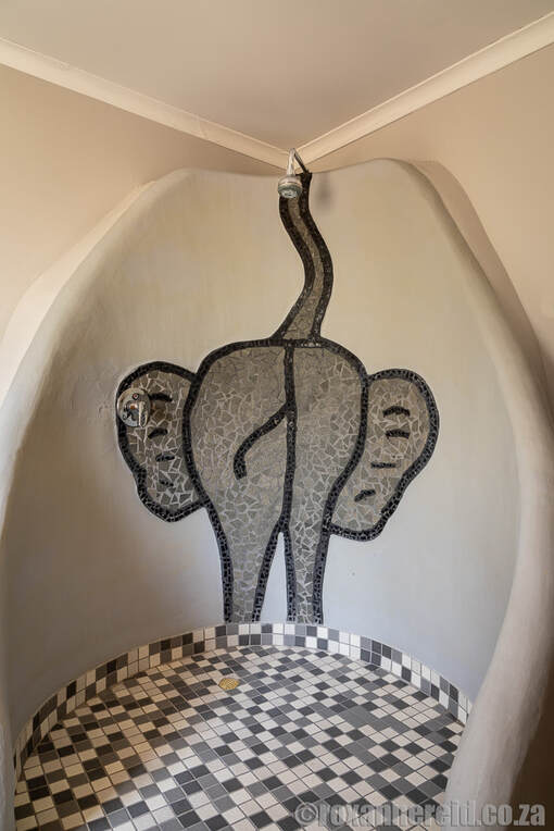 Shower with an elephant at Etosha Safari Camp