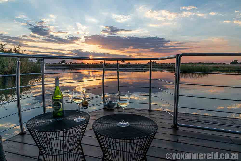 Where to stay Namibia: sunset from Namushasha River Villa, Zambezi houseboat