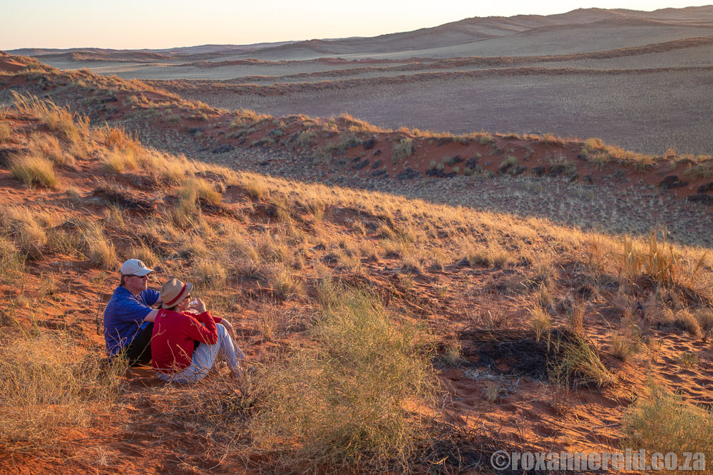 Sundowners on a red dune at the Desert Grace near Sossusvlei