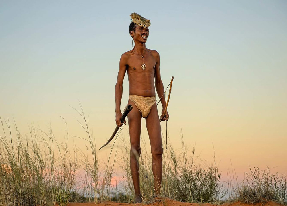 Ç‚Khomani heritage site in South Africa: San man with bow and arrow